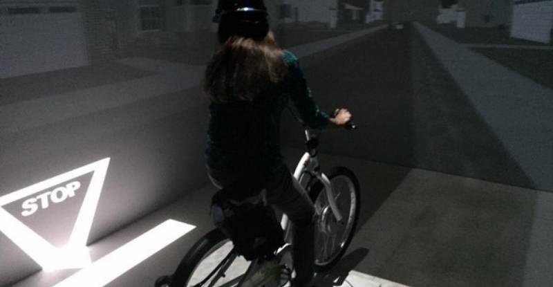 Photo of person riding on bike.